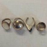 FOUR VARIOUS SILVER RINGS