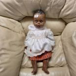 LARGE ARTICULATED ETHNIC DOLL WITH CLOTHING