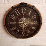 LARGE CIRCULAR BATTERY CLOCK IN THE FORM OF A COMPASS