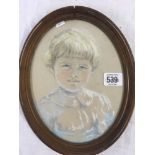 OVAL PASTEL PORTRAIT OF A LITTLE GIRL.