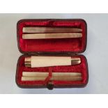 CASED CHEROOT HOLDER WITH 9ct GOLD MOUNTS