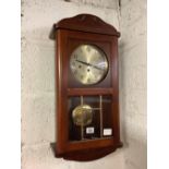 MODERN MAHOGANY STRIKING WALL CLOCK WITH BRASS PENDULUM