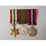 3 WW II RAF MINIATURE MEDALS IN ORIGINAL BOX TO W HOLT ESQ