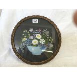 A CIRCULAR WATERCOLOUR STILL LIFE STUDY OF ASSORTED FLOWERS IN A BLUE BOWL, CONTAINED WITHIN A