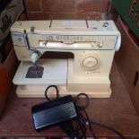 2 SINGER PORTABLE SEWING MACHINES, 1 WITH COVER