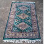 2 PATTERNED RUGS, ONE GREEN, 6ft 1'' X 3ft 2'' & RED, 3ft 9'' X 2ft 6''