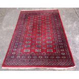 2 RED PATTERNED RUGS, 4ft 7'' & 7ft 11'' X 4ft 10''