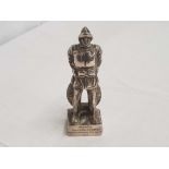 WHITE METAL FIGURE OF A LIFE BOAT MAN BEING AN AWARD TO MISS LILIAN DOWZER FOR WORK FOR THE LIFE
