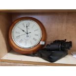 A ROUND ACCTIM BATTERY OPERATED WALL CLOCK & A PAIR OF BINOCULARS BY TASCO, 7X- 15 X 35 ZOOM WITH