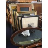 CARTON OF PRINTS, PICTURES & OVAL DARK FRAMED BEVELLED MIRROR