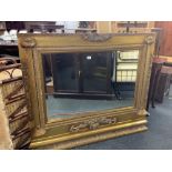 HEAVILY DECORATED & GILDED OVER MANTLE BEVELLED GLASS MIRROR, APPROX 50'' WIDE