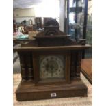 OAK CASED MANTEL CLOCK WITH PILLARS, WOOD FINIAL & OTHER MISSING
