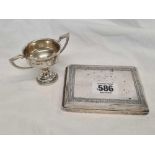 AN INDIAN WHITE METAL CARD CASE TESTED AS SILVER AND A SMALL SILVER TROPHY CUP H/M B'HAM 1931