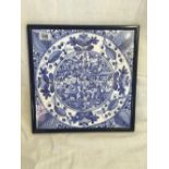 A FRAMED SET OF 4 BLUE AND WHITE DELFT STYLE TILES IN ONE FRAME