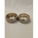 A PAIR OF EDWARDIAN SILVER NAPKIN RINGS, B'HAM 1901