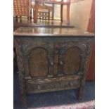 CARVED OAK DRINKS CABINET WITH DRAWER UNDER, 26'' WIDE, TOP MARKED