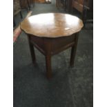 1930'S OAK CIRCULAR SEWING BOX ON LEGS WITH HINGED TOP & SATIN INTERIOR