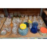 SHELF OF MIXED GLASSWARE INCL; DRINKING GLASSES, SUGAR POTS,