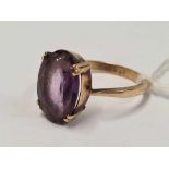 9ct OVAL PURPLE STONE RING