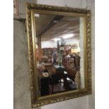 GILT FRAMED WALL MIRROR, 33'' X 24'' OVERALL