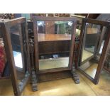 HEAVY CARVED OAK TRIPLE SWING MIRROR WITH TURNED SUPPORTS