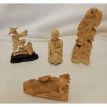 FOUR MORE CARVED FIGURES