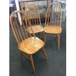 3 MATCHING ERCOL STYLE STICK BACK DINING CHAIRS, MARKED