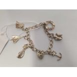 A SILVER CHARM BRACELET