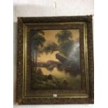 GILT FRAMED OIL ON BOARD OF A LAKE SCENE WITH YACHT'S SIGNED BOCKER