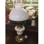 BRASS & CERAMIC TABLE LAMP IN THE STYLE OF AN OIL LAMP WITH CHIMNEY & GLASS SHADE