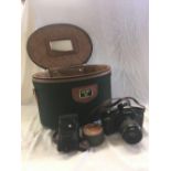 CANNON EOS 850 CAMERA, FLASH ATTACHMENT CONTAINED IN A GREEN ANTLER VANITY CASE