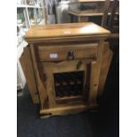 SMALL MEXICAN PINE CARVED CUPBOARD WITH DRAWER & MAGAZINE RACK