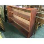 STAINED PINE BOOKCASE, 5ft LONG & ANOTHER WITH ADJUSTABLE SHELVING, 40'' LONG