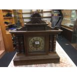 OAK CASED MANTEL CLOCK WITH PILLARS, WOOD FINIAL & OTHER MISSING