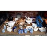 SHELF OF VARIOUS CHINAWARE INCL; TEAPOTS, GLASS DOLPHIN PAPERWEIGHTS,