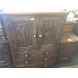 MID CENTURY & CARVED OAK TALL BOY & SMALL MID CENTURY OAK CABINET BOTH BY WILLIAMS & COX TORQUAY