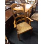 LIGHT OAK RUSH SEATED LADDER BACK CARVER CHAIR