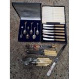 CASE OF SIX SILVER PLATED DECORATIVE SPOONS WITH BIRD FINIALS & SIX BUTTER KNIVES WITH SILVER