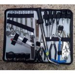 SMALL TOOL KIT IN A BLACK ZIP CASE