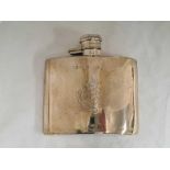 A SILVER HIP FLASK OF CURVED OUTLINE