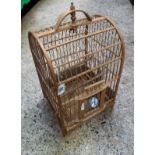 AN EARLY WOODEN BIRD CAGE