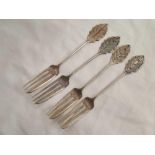 FOUR EASTER SILVER CAKE FORKS,