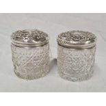 2 SILVER EMBOSSED TOP DRESSING TABLE JARS, CHESTER 1907