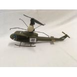 SMALL PLASTIC MODEL OF A US ARMY HELICOPTER WITH PETROL ENGINE, NOT KNOWN IF WORKING