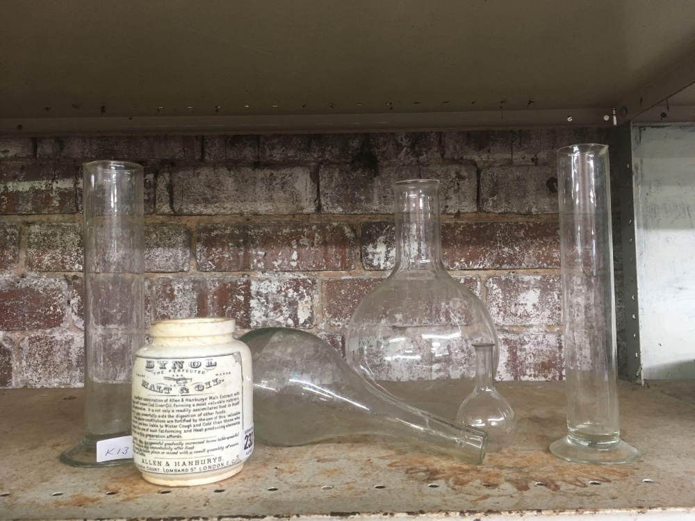 SHELF WITH VARIOUS GLASS CHEMISTRY ITEMS & A BYNOL MALT & OIL JAR