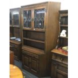 LINEN FOLD CUPBOARD/DISPLAY CABINET WITH LEADED GLASS DOORS TO TOP, 4ft6'' WIDE