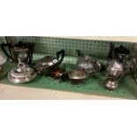 SHELF OF PLATED TEA POTS, JUGS ETC