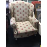UPHOLSTERED HIGH BACK WING ARMCHAIR