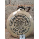 ROUND STONEWARE HOT WATER BOTTLE BY HOLMAN, HAM & COMPANY,