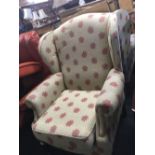 UPHOLSTERED HIGH BACK WING ARMCHAIR